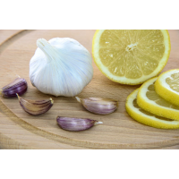 Foto auf Plexiglas - Knoblauch und Zitrone